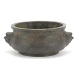 Large Chinese patinated bronze censer with animalia handles, four figure character marks and