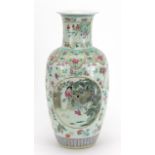 Large Chinese porcelain baluster vase finely hand painted in the famille rose palette with panels of