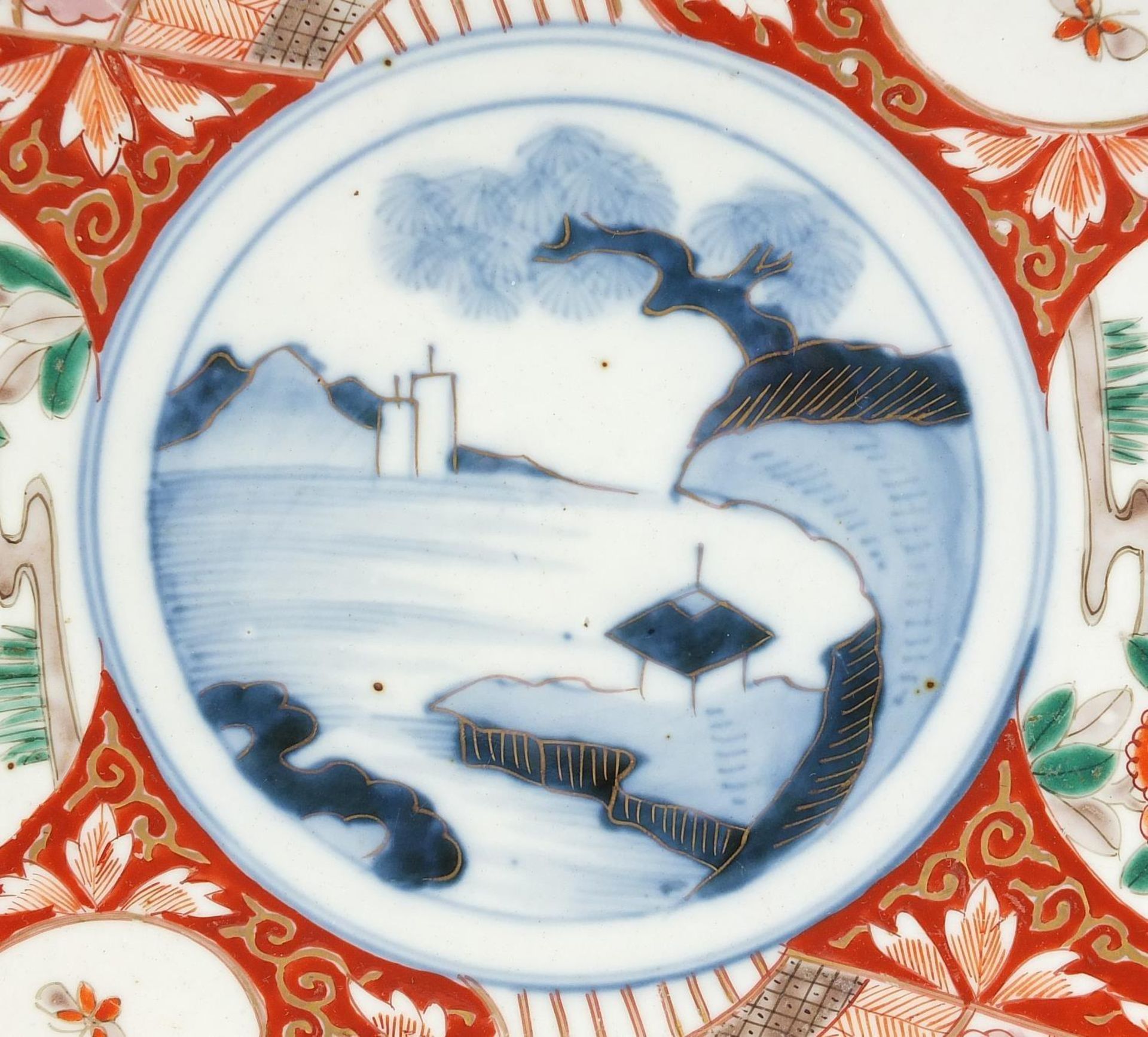 Japanese Imari comprising a pair of chargers hand painted with flowers and landscapes and a bowl, - Image 3 of 11