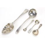 Early 19th century and later silver spoons including a berry spoon by William Sumner and a caddy