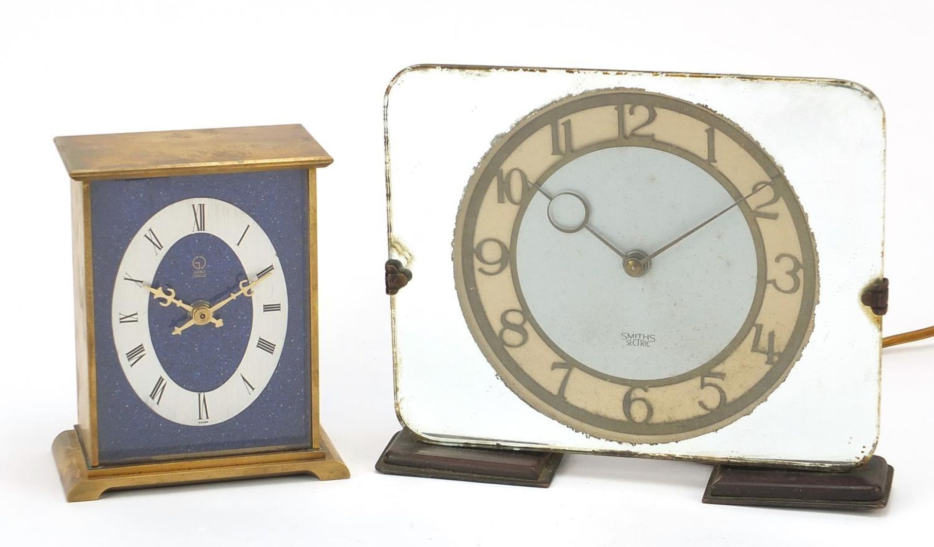 Two mantle clocks comprising a Smiths Sectric glass with Bakelite feet and a gold circle example