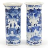 Pair of Chinese blue and white porcelain vases hand painted with figures in river landscapes, four