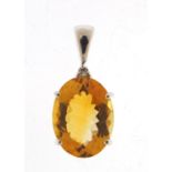 9ct white gold mandarin citrine and white topaz pendant, 2.5cm high, 4.6g :