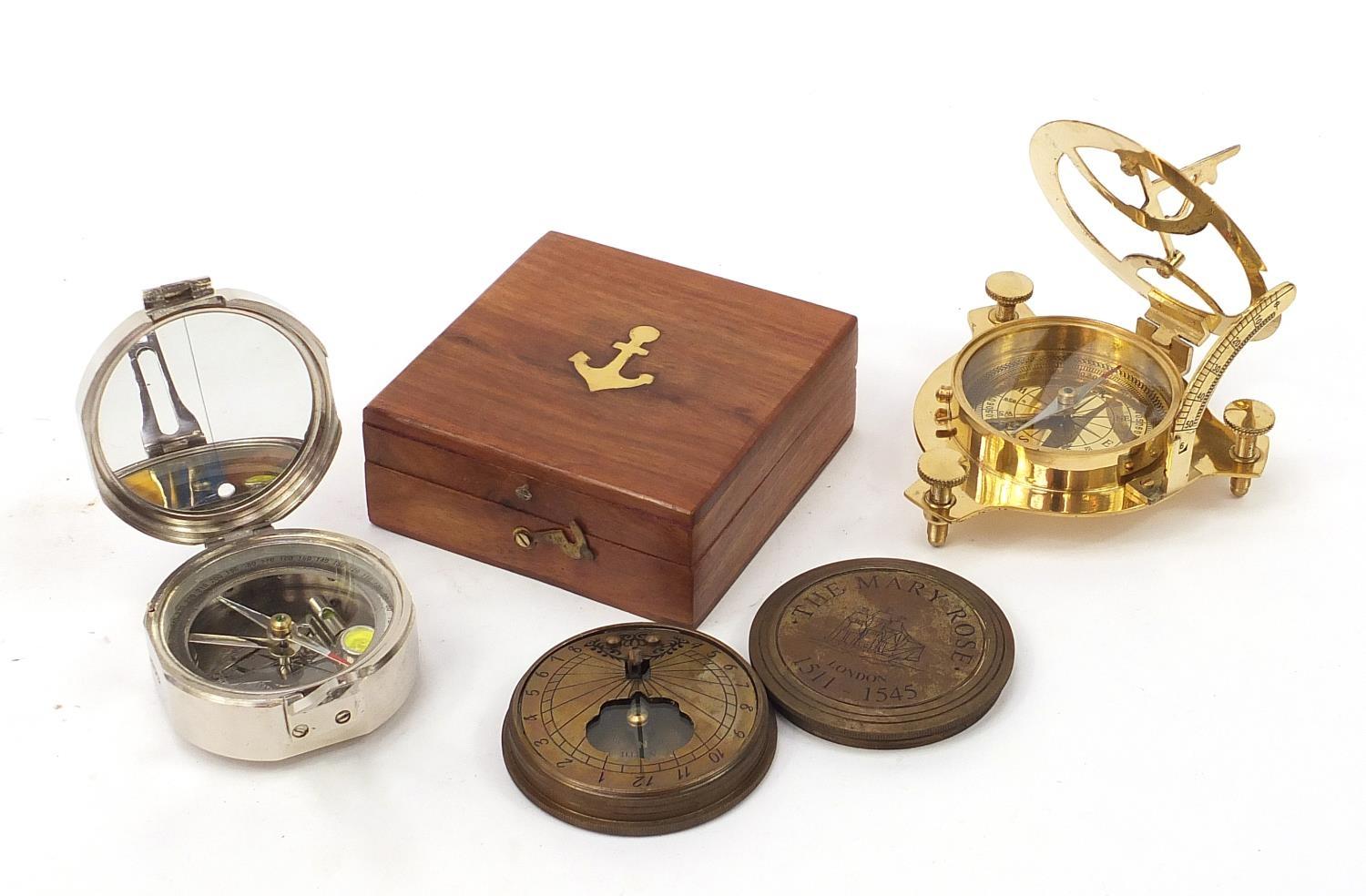 Three naval/military interest compasses including two with sundials :