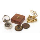 Three naval/military interest compasses including two with sundials :