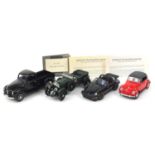 Four Franklin Mint die cast precision model vehicles including 1967 Volkswagen and 1988 Porsche