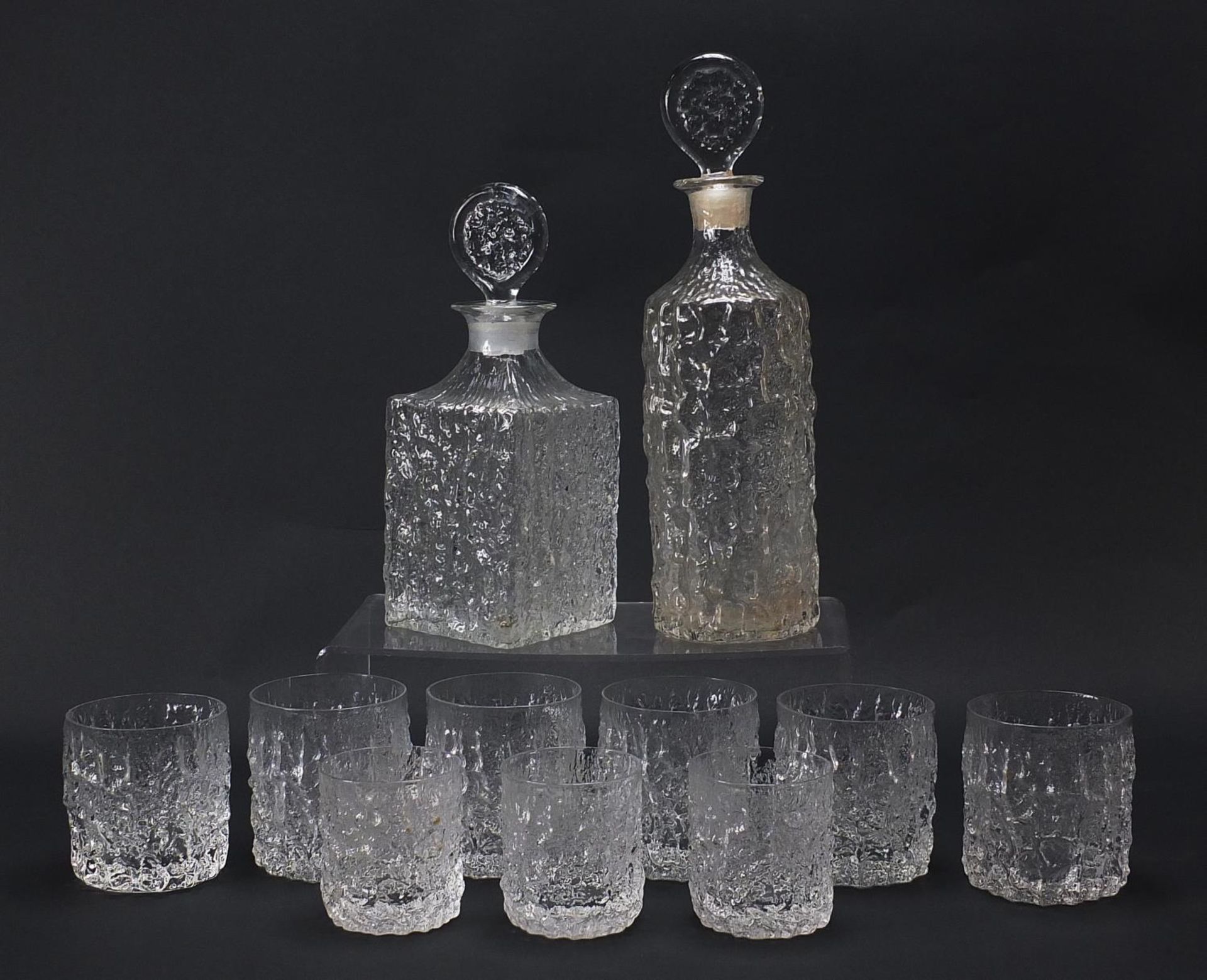 Geoffrey Baxter for Whitefriars, textured glassware comprising two decanters, set of six tumbles and - Image 4 of 4