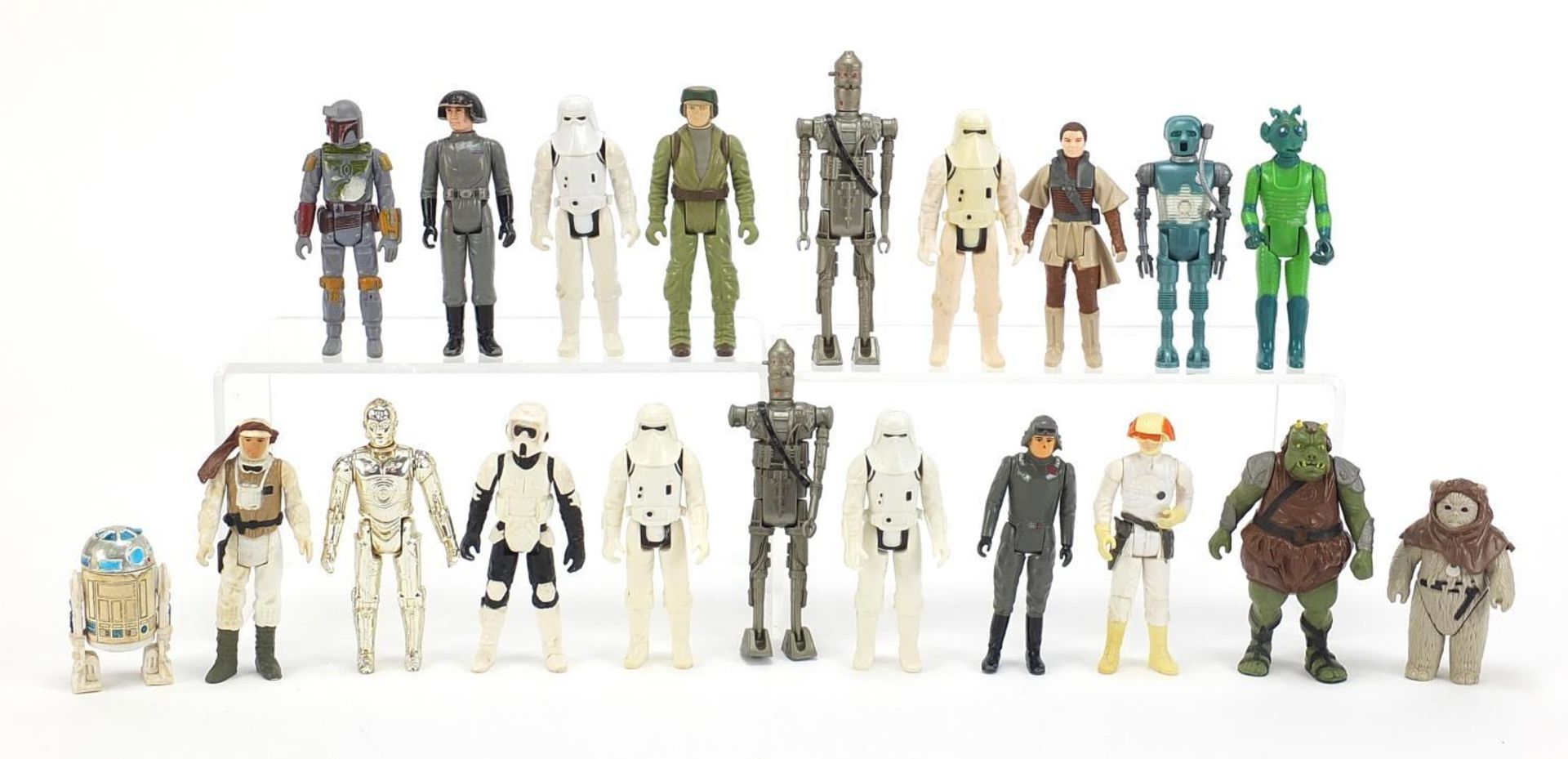 Twenty 1970's and later Star Wars action figures including Stormtroopers, C3PO and box, Ewok and