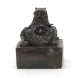 Very large Chinese patinated bronze dragon seal, character marks to the underside, 16cm high :