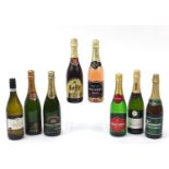 Eight bottles of sparkling wine including Champagne and Prosecco :