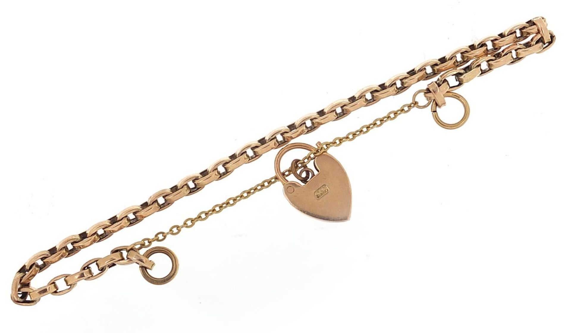Unmarked gold bracelet, (tests as 9ct gold) with a 9ct gold loveheart padlock, 16cm in length, 7. - Image 3 of 4