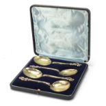 Set of four antique silver gilt apostle spoons, housed in a velvet and silk lined fitted case by