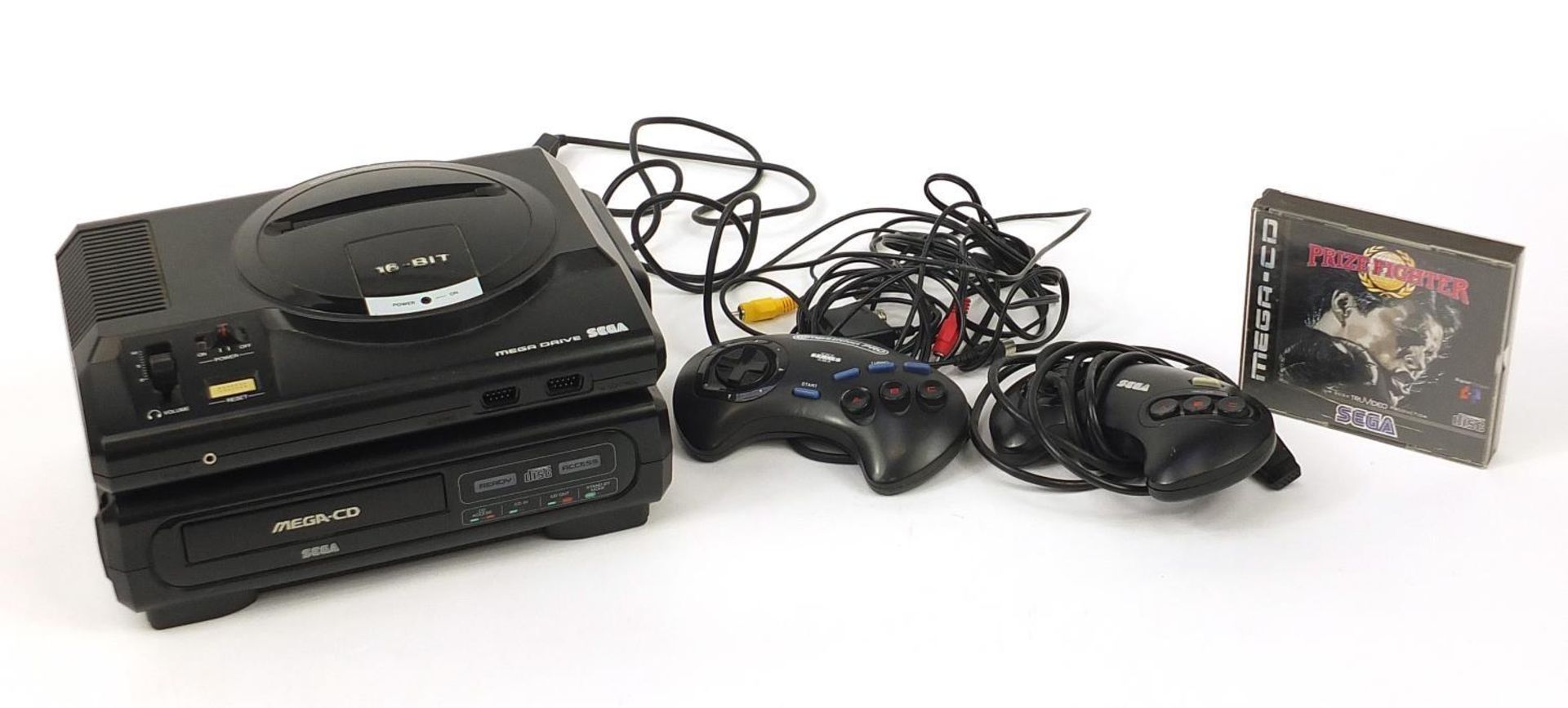 Sega Mega Drive games console with Mega-CD converter and controllers :