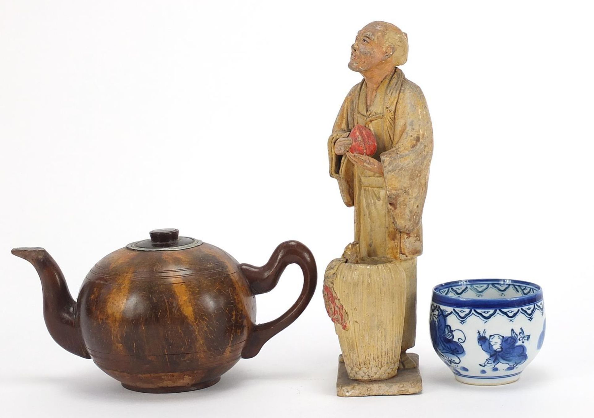 Oriental objects including a carved wood teapot and pottery figure of a man holding a peach, the - Image 3 of 9