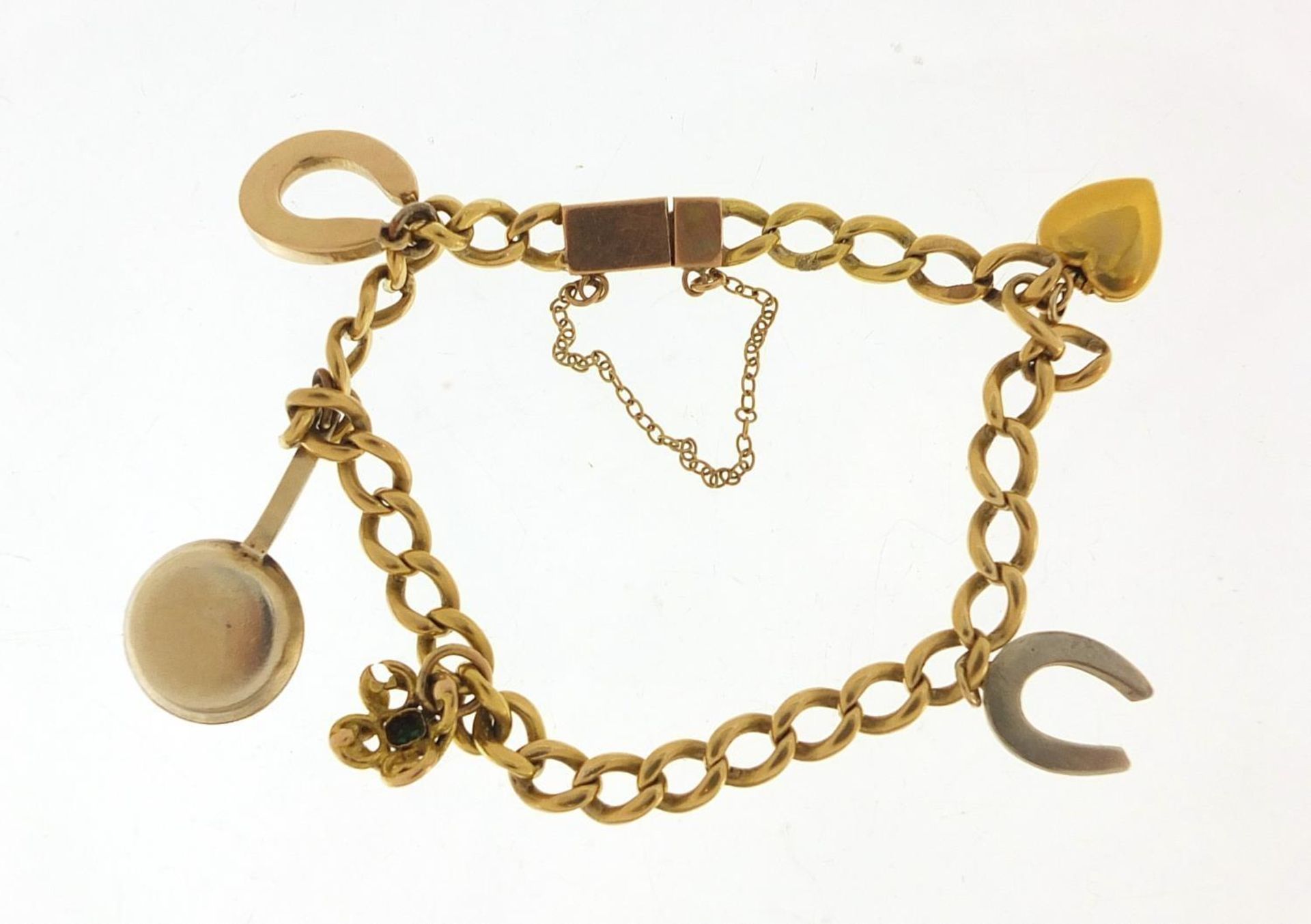 Unmarked gold bracelet with gold and silver charms, the bracelet tests as 18ct gold, total 23.0g : - Image 4 of 6