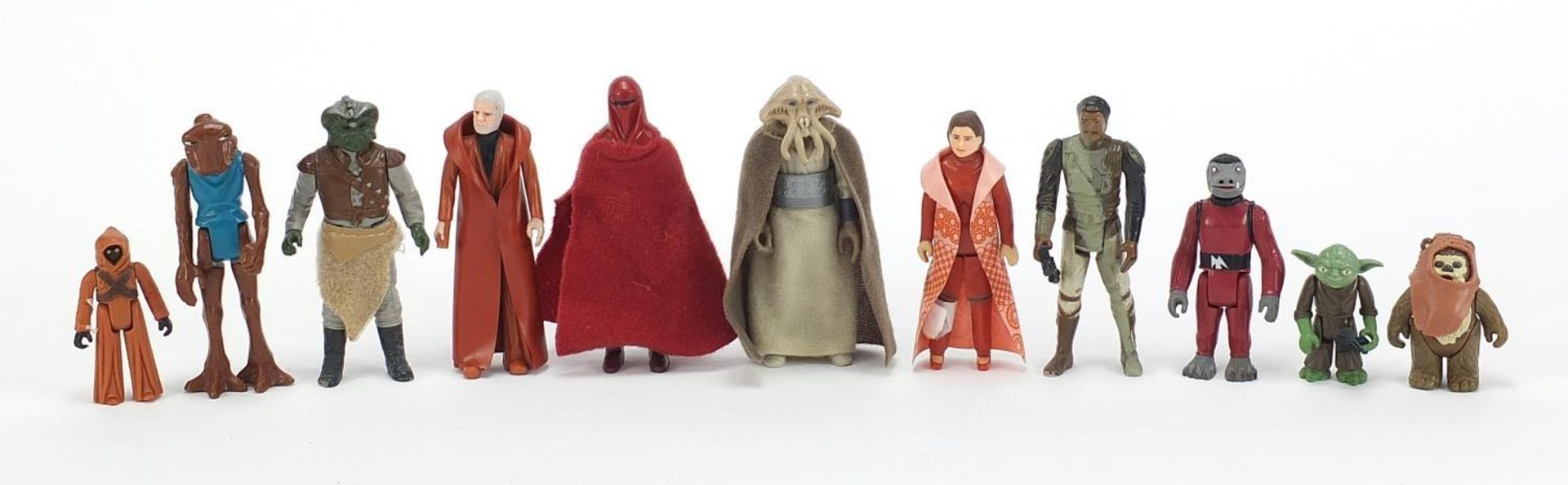 Eleven 1970's and later Star Wars action figures with accessories including Yoda :