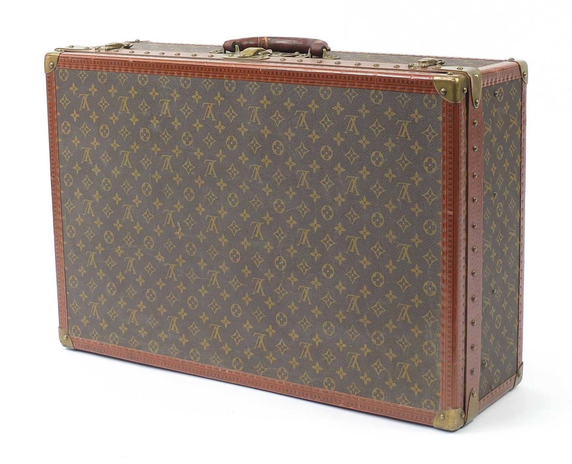 Louis Vuitton, early 20th century suitcase with lift out tray, various impressed marks to the - Image 4 of 8