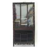 Antique Chinese hardwood glazed display case on stand with adjustable glass shelves, profusely