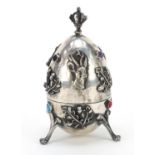 Russian silver egg shaped trinket, decorated with wild animals, opening to reveal a leaping stag,