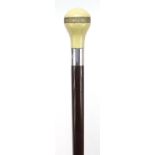 Art Deco hardwood walking stick with silver mounted pommel, 93cm in length :