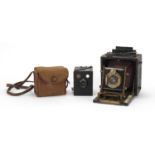 Vintage cameras including a folding example a Kodak box camera :