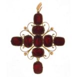 Large antique gold coloured metal red stone pendant, possibly garnet, 7cm high, 11.5g :