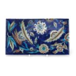 Turkish Iznik tile fragment hand painted with flowers and foliage, 21cm x 12cm :