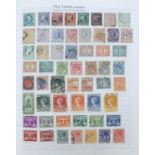 19th century and later world stamps arranged in an album including Netherlands, New Zealand,