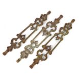 Three Victorian cast iron stair rods, each numbered 25 and 84cm in length :