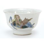 Chinese porcelain footed bowl hand painted in the famille verte palette with three mythical animals,