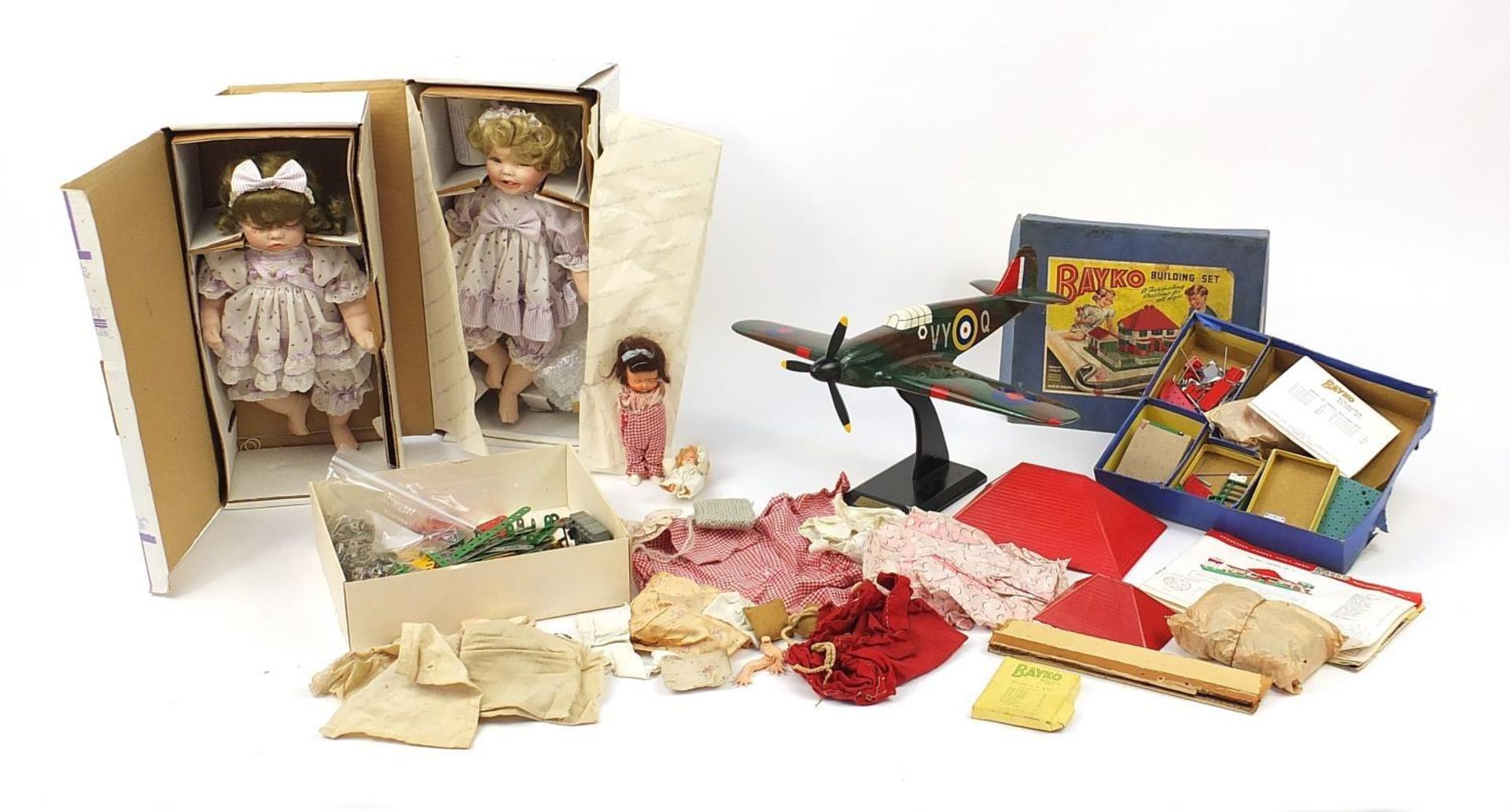 Vintage and later toys including a large model Hawker Hurricane, Meccano, two bisque head