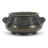 Good Chinese patinated bronze censer with animalia handles, four figure character marks to the base,