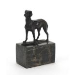 Patinated bronze greyhound raised on a rectangular block marble base, 19cm high :