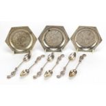 Set of six silver coloured metal seahorse design teaspoons and three silver plated dishes, the