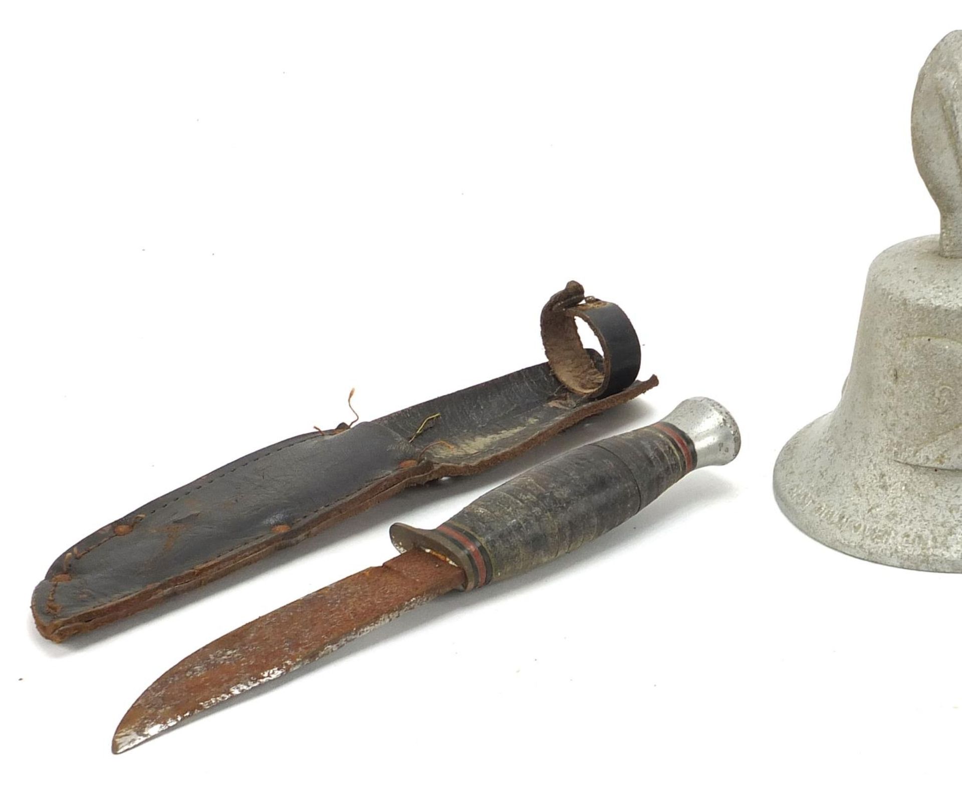 Militaria comprising a bell made from a German aircraft, folding pocket knife and a combat knife, - Image 2 of 5