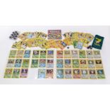 Pokemon collectables including original base set holographic cards, 1st Edition Machamp and other