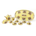 Czechoslovakian Royal Vienna style yellow cabaret set decorated with lovers comprising a coffee pot,