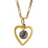 9ct gold and paste love heart pendant on a 9ct gold Figaro link necklace, 1.5cm high and 56cm in