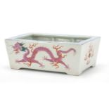 Good Chinese porcelain planter finely hand painted in the famille rose palette with two dragons