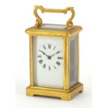 Brass cased carriage clock with enamel dial and Roman numerals, 11.5cm high :For Further Condition