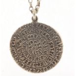 Silver Egyptian revival hieroglyphics medallion on a silver necklace, 4cm and 70cm in length,