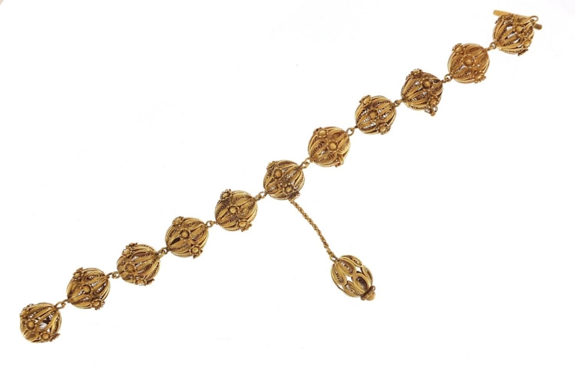 Unmarked gilt metal filigree ball bracelet, 20cm in length, 31.2g :For Further Condition Reports