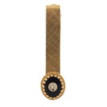 14ct gold diamond and black onyx tie clip, 4.5cm in length, 5.8g :For Further Condition Reports