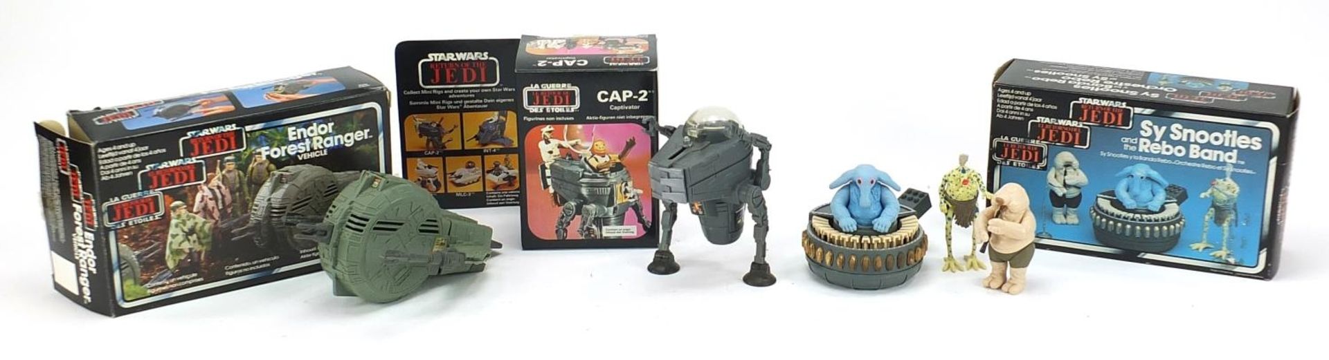 Three vintage Star Wars Return of the Jedi toys with boxes by Kenner comprising CAP-2, SY Snootles