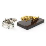 Jaguar gold plated car mascot and a chrome and glass jaguar desk paperweight, the largest 18.5cm