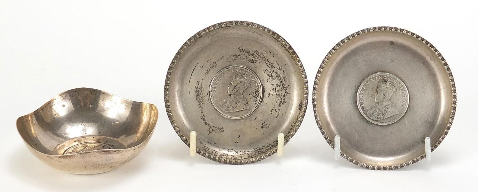 Three Indian silver one rupee coin set dishes comprising 1901, 1917 and 1917, the largest 8.5cm in