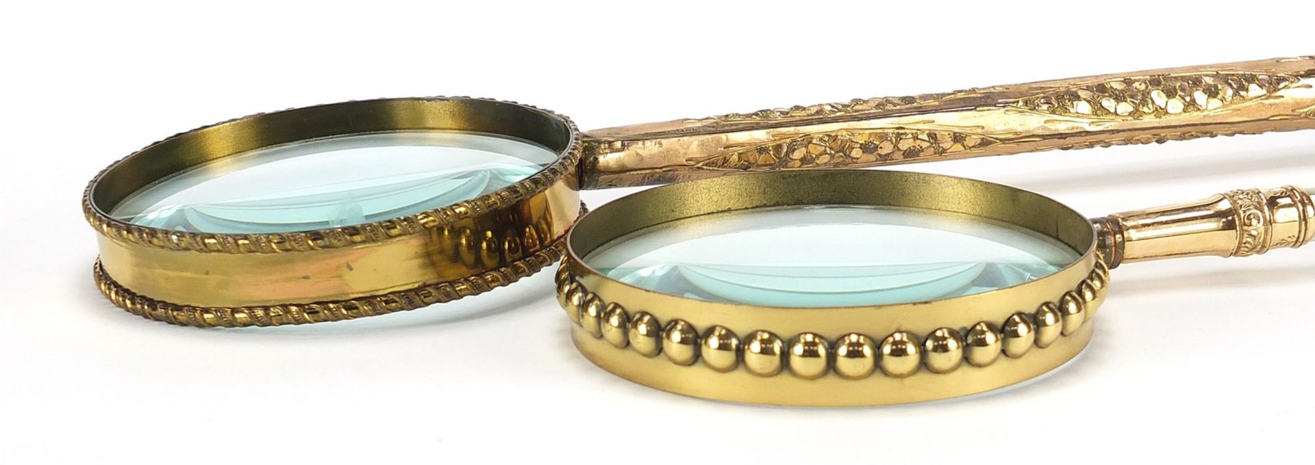 Two large antique gilt metal magnifying glasses including one with mother of pearl handles, the - Image 4 of 4