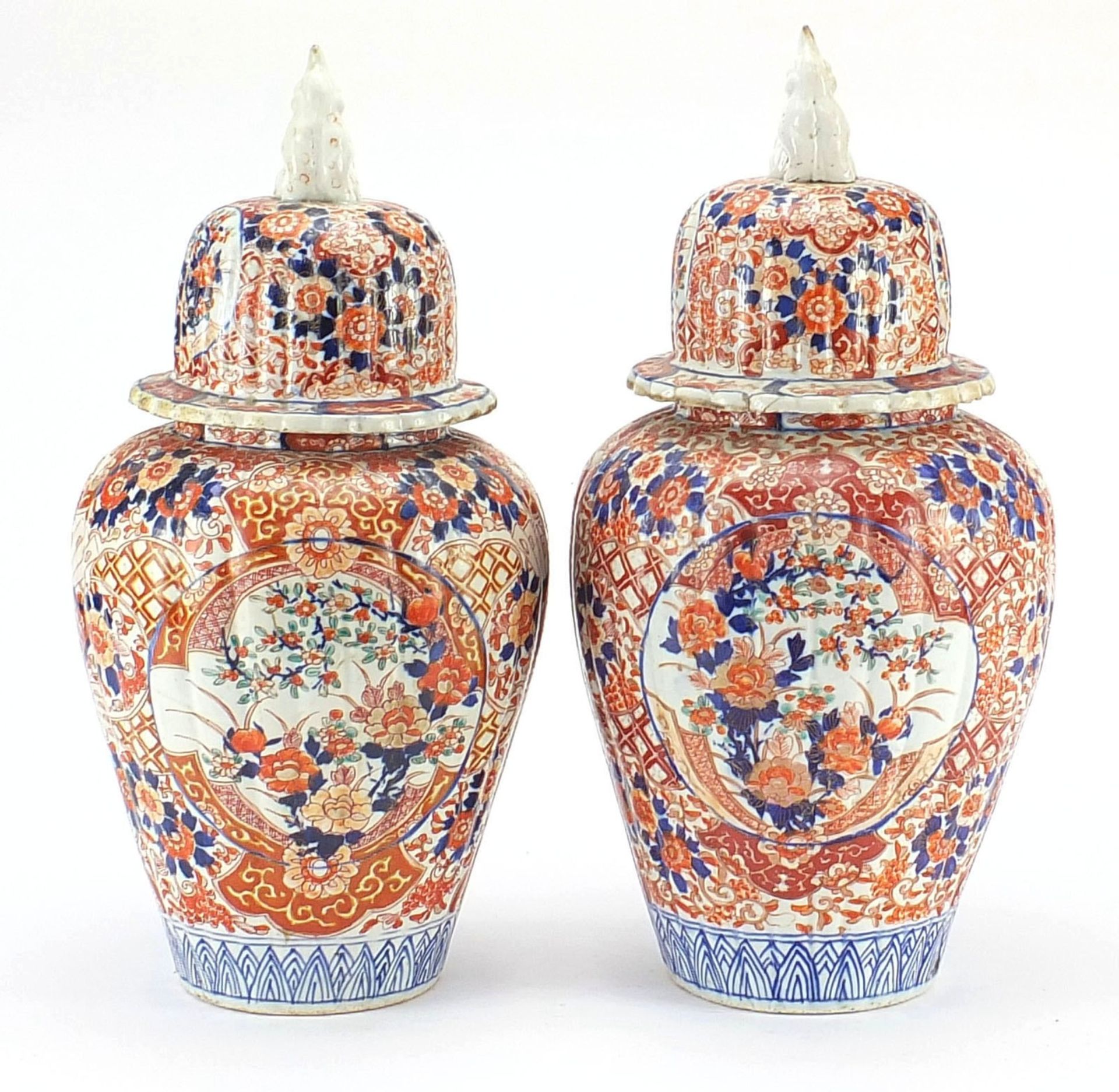 Large pair of Japanese Imari lidded porcelain vases, each profusely hand painted with flowers, - Image 4 of 9