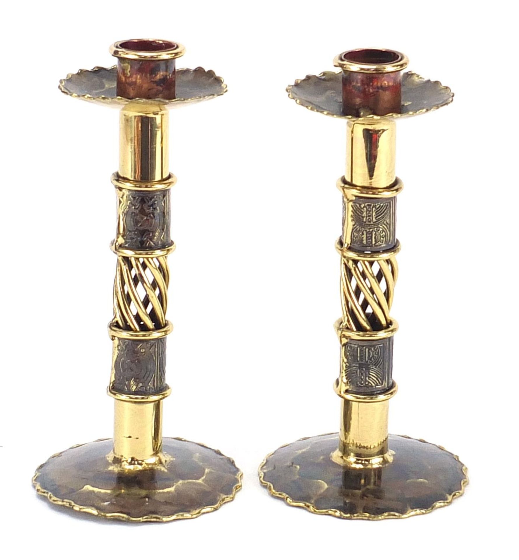 Pair of Arts & Crafts design brass candlesticks, each 17cm high :For Further Condition Reports