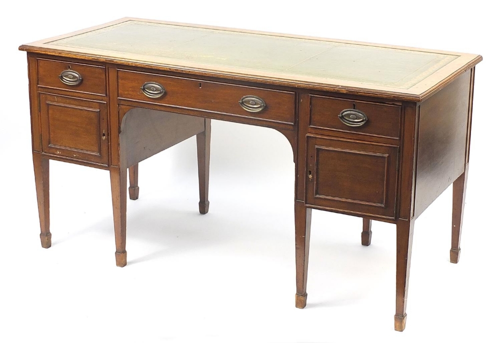 Edwardian mahogany pedestal writing desk with green tooled leather insert above three drawers and